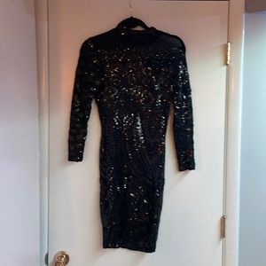 Small. Sequined, mesh dress. Fitted dress and stretches. Worn twice.